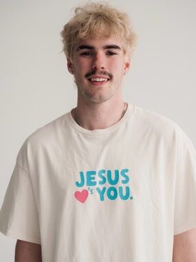 Cream Graphic Tee with Turquoise 'Jesus Loves You' Print